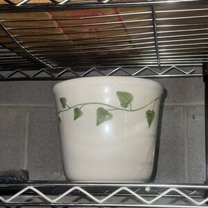 Elegant White Planter with Green Leaf Design